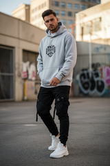 Male model wearing grey RAAR Men's Oversized Hoodie